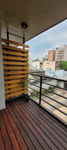 a balcony with a view of a city skyline at Edificio 9 de Julio in San Miguel de Tucumán