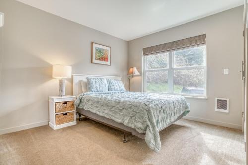 Ένα ή περισσότερα κρεβάτια σε δωμάτιο στο The Sandpiper - Rockaway - Meredith Lodging