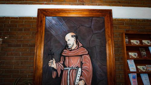a painting of a man on a door at Hotel Casa del Fraile in Morelia