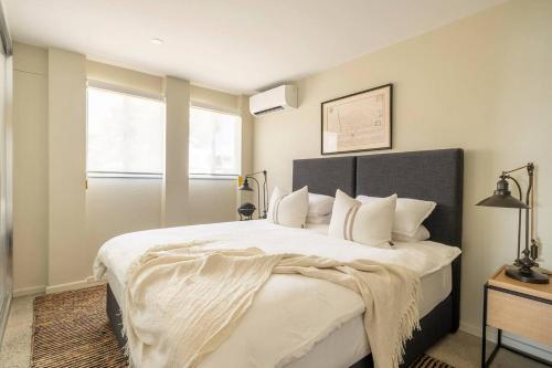Ένα ή περισσότερα κρεβάτια σε δωμάτιο στο Waterfront Duplex 5 bedrooms 5 bathrooms