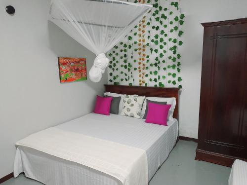 Ένα ή περισσότερα κρεβάτια σε δωμάτιο στο Villa Vinsanda