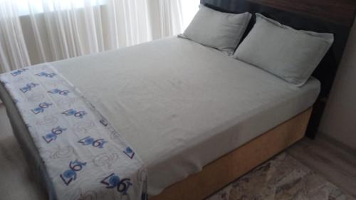 Ένα ή περισσότερα κρεβάτια σε δωμάτιο στο Family Apatment Cheap Vacation House Home - BE MY GUEST