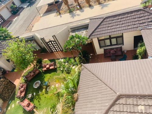 an overhead view of a house with a garden at استراحة ريف طيبة in Medina