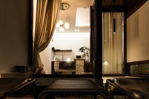 a view of a living room from a room with a window at Haengok Guesthouse in Jeonju