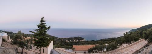 a view of the ocean from the top of a mountain at SAPPHIRE AGIOS NIKITAS in Drymon
