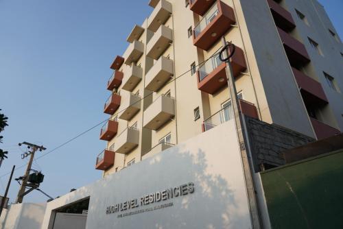 a building with a sign in front of it at Spacious Luxury apartment in Relaxing homey env. in Maharagama