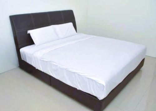 Postel nebo postele na pokoji v ubytování Hotel Lean Fatt