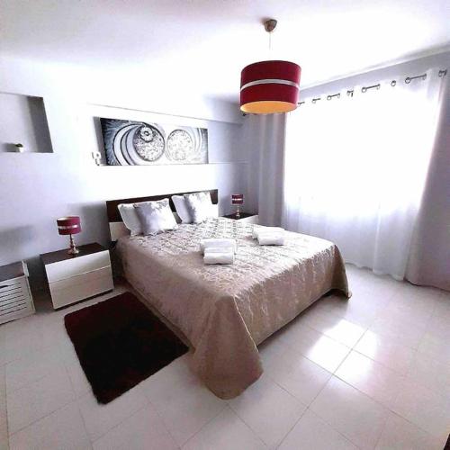 Ένα ή περισσότερα κρεβάτια σε δωμάτιο στο Paradise House - Apartment in Villa with private pool and private garden