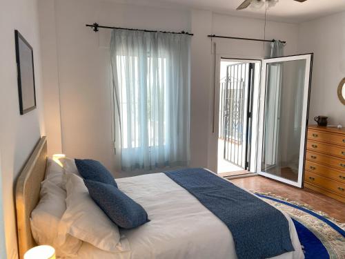 Ένα ή περισσότερα κρεβάτια σε δωμάτιο στο Casa Hyam