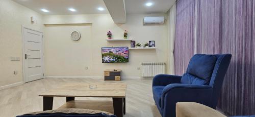 Χώρος καθιστικού στο Park Azure Comfortable Apartment