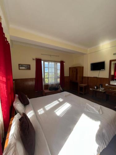 Una cama o camas en una habitación de Ifseen Villa