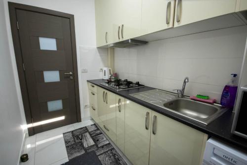 Kuchyň nebo kuchyňský kout v ubytování AStar Apartments - LARGE
