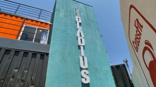 Casa Gladiusに飾ってある許可証、賞状、看板またはその他の書類