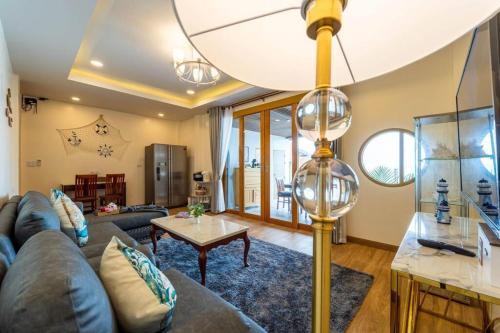 Posezení v ubytování Come Home Beach Villa, 3 Bedrooms CA3