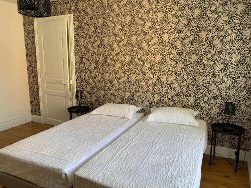 Postel nebo postele na pokoji v ubytování COTTAGE DU PARC