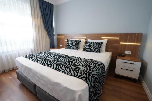 Cama o camas de una habitación en My Suite House