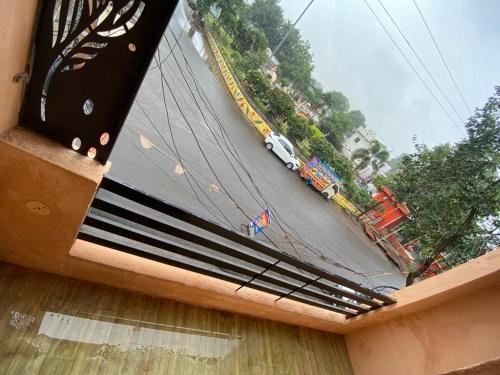 a view of a suspension bridge with a car on a road at Hotel khatu shyam palace in Ujjain