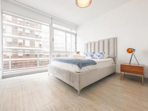 Llit o llits en una habitació de Boutique Apartments Panama Atlapa