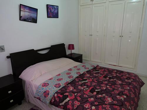 Кровать или кровати в номере Palmeraies vacances Tunis