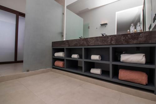 Ett badrum på My Blue Hotel Holbox