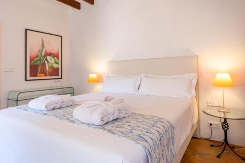Katil atau katil-katil dalam bilik di Hotel Can Verdera