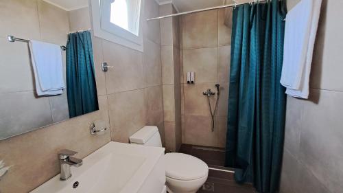 Koupelna v ubytování Olympia Suites