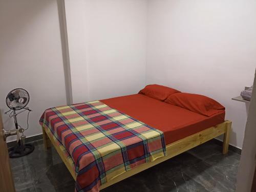 Apartamento moderno céntrico Palmira tesisinde bir odada yatak veya yataklar