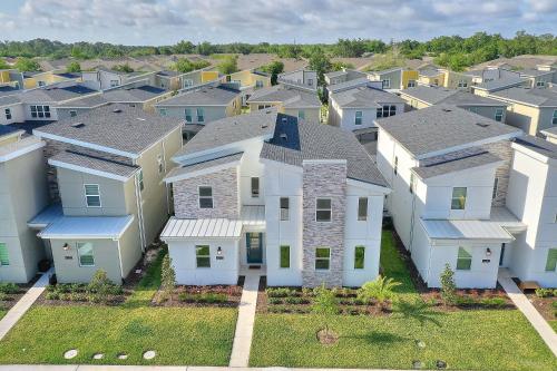 an aerial view of a row of houses at Luxury Villa near Disney 8 Bedroom Private Pool & Playground1 in Kissimmee
