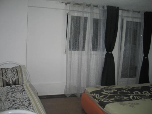 Postel nebo postele na pokoji v ubytování Guest House Dena
