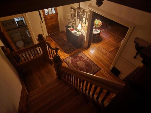 an overhead view of a living room with a fireplace at Downen House Bed & Breakfast in Pueblo