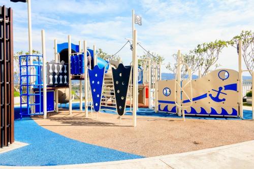 a playground with a slide in a park at Kuantan Imperium Residence Studio With Netflix by I-Home in Kuantan