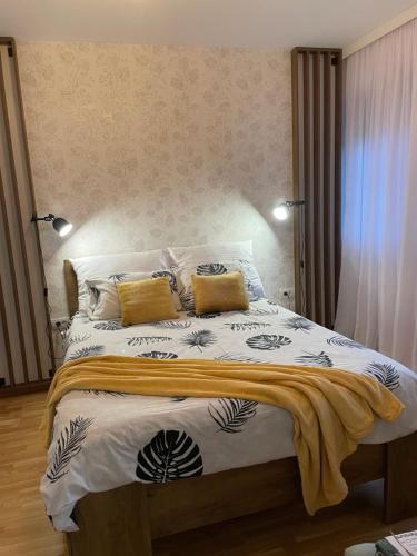 Ένα ή περισσότερα κρεβάτια σε δωμάτιο στο Apartman Bela Reka Zlatibor