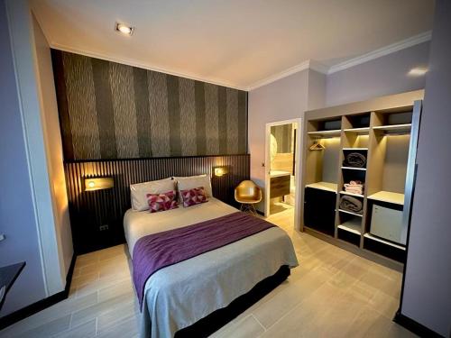 Postel nebo postele na pokoji v ubytování La Blanca Hotel