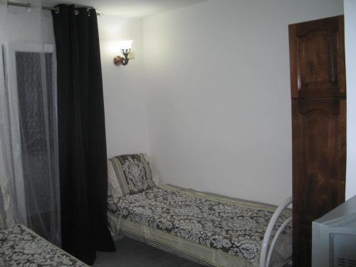 Postel nebo postele na pokoji v ubytování Guest House Dena