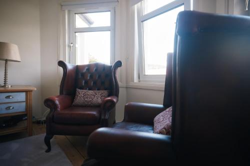 Posezení v ubytování Loch Lomond Apartment