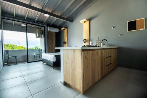 a bathroom with a sink and a counter top at Barcelo Coliving in Medellín
