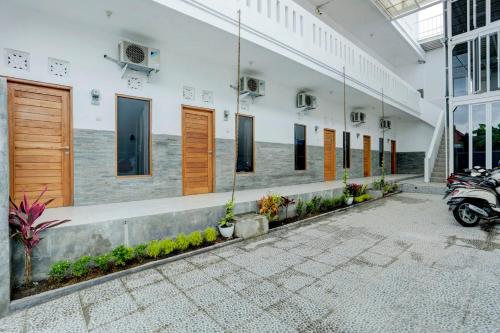 Фотография из галереи OYO Life 1942 Asia Residence Syariah в городе Семаранг
