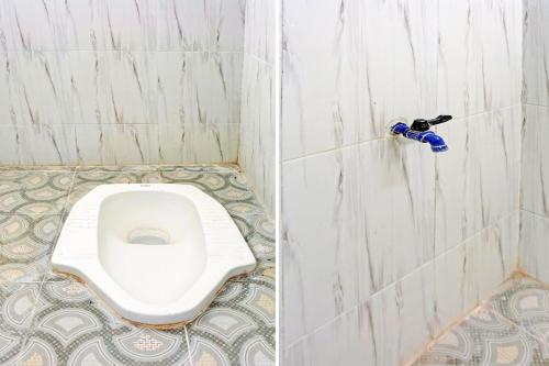 Koupelna v ubytování OYO Life 92353 Purnama Syariah Guest House