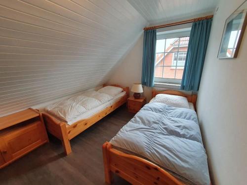 Postel nebo postele na pokoji v ubytování Haus Angelika