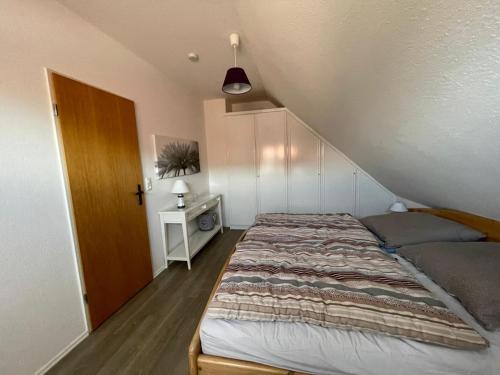 En eller flere senge i et værelse på Haus Louise