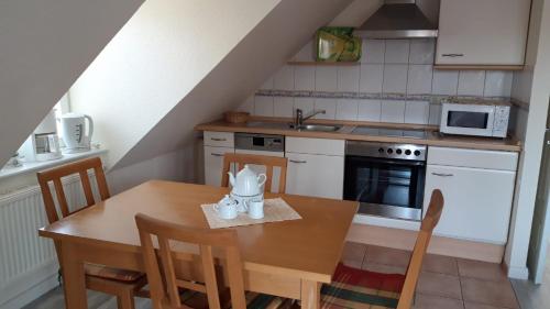 Kuchyň nebo kuchyňský kout v ubytování Wohnung Weeto