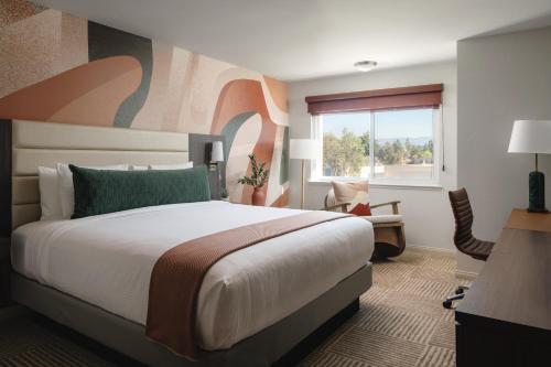 a hotel room with a bed and a window at Avante, a JDV by Hyatt Hotel in Mountain View