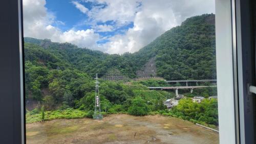 a view of a mountain view from a window at Toyoko Inn Fujisan Otsuki-eki in Ōtsuki