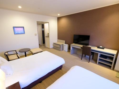 Televisyen dan/atau pusat hiburan di Hotel Buena Vista