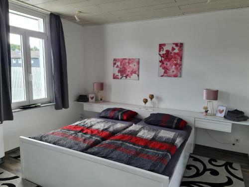 Postel nebo postele na pokoji v ubytování Drea's Ferienwohnung