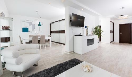 TV a/nebo společenská místnost v ubytování D_Loft Downtown