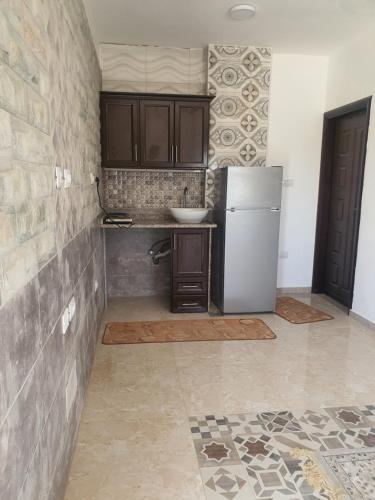 مطبخ أو مطبخ صغير في One room for rent