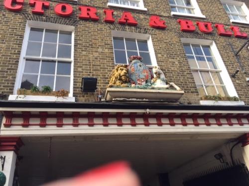 a building with a sign on the front of it at The Royal Victoria & Bull Hotel in Rochester