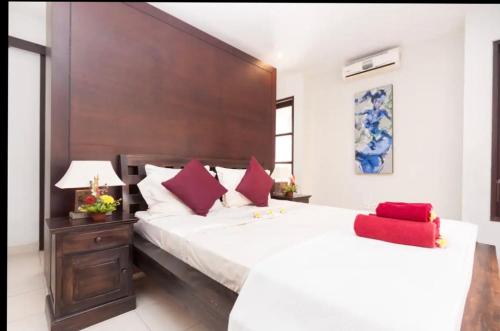 En eller flere senge i et værelse på Villa Kubu Pratiwi - Villa 2