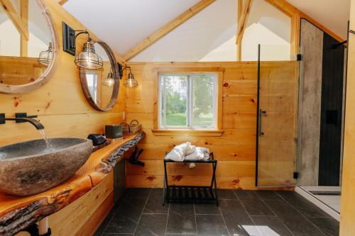 a bathroom with a sink and a shower at The Preserve Battenkill River in Cambridge